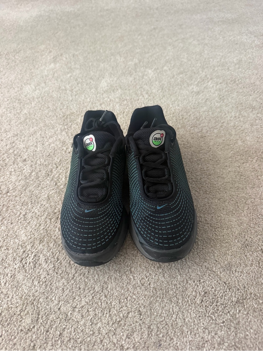 Nike Kids Black Sneakers with Teal Stitching